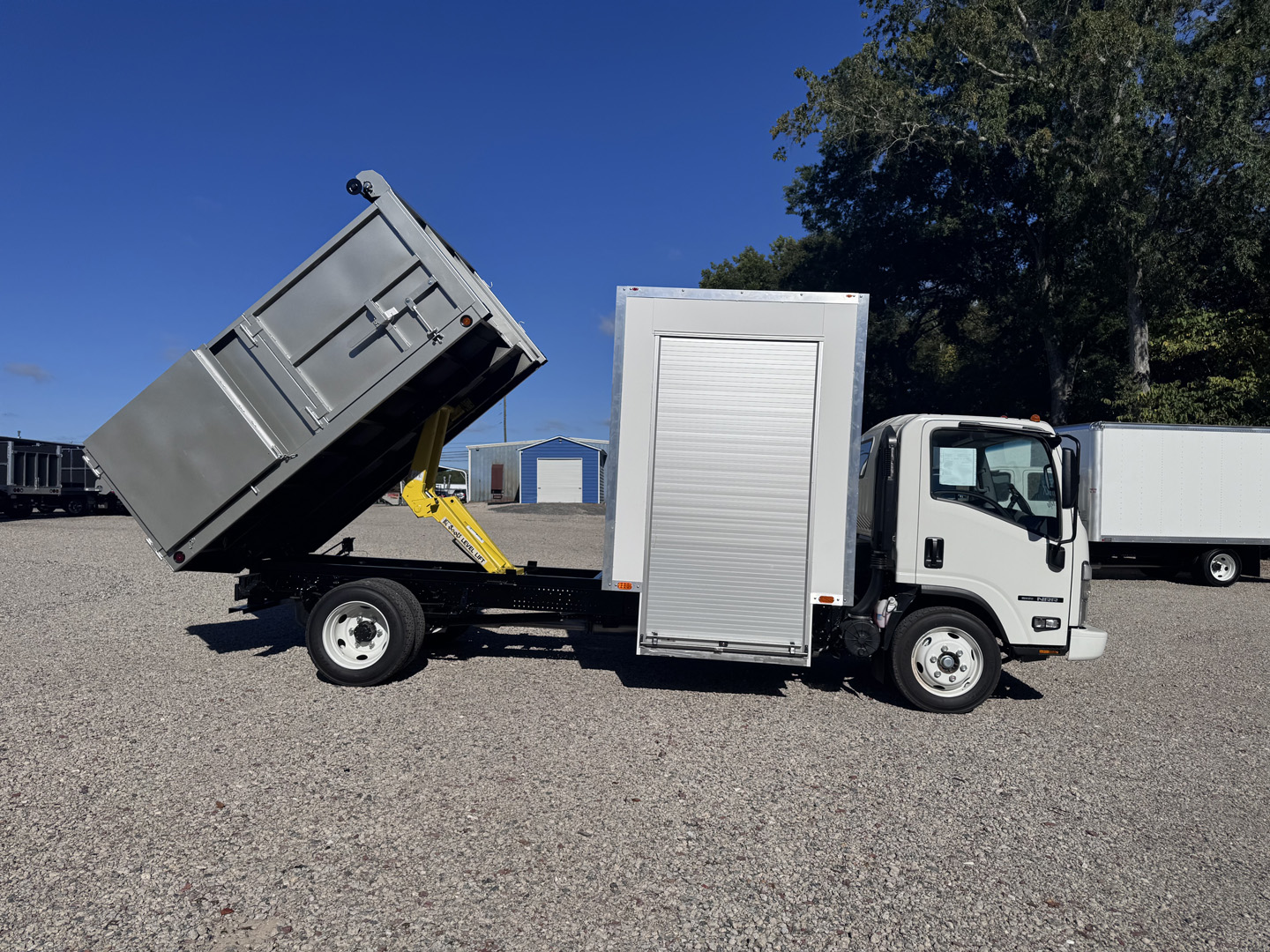 *NEW 2026 Isuzu Gas 1U404, Single Cab, Canyon 10′ Dump and 6′ Tool Shed SCT with 48″ Roll Up Door